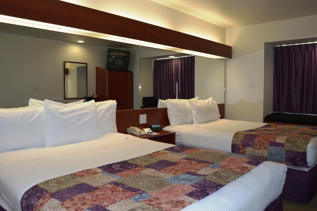 Microtel Inn And Suites By Wyndham Miami Ok Номер фото